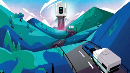 Pickup truck pulling trailer on road through mountains, toward large EV charging station.