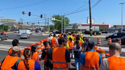 State, city and county officials involved with the $9.5 billion Purple Line project walk a two-mile loop around the planned stop in Langley Park, Md., to understand issues residents and business owners are facing amidst construction, and what infrastructure is needed to make the light rail an asset for the community.