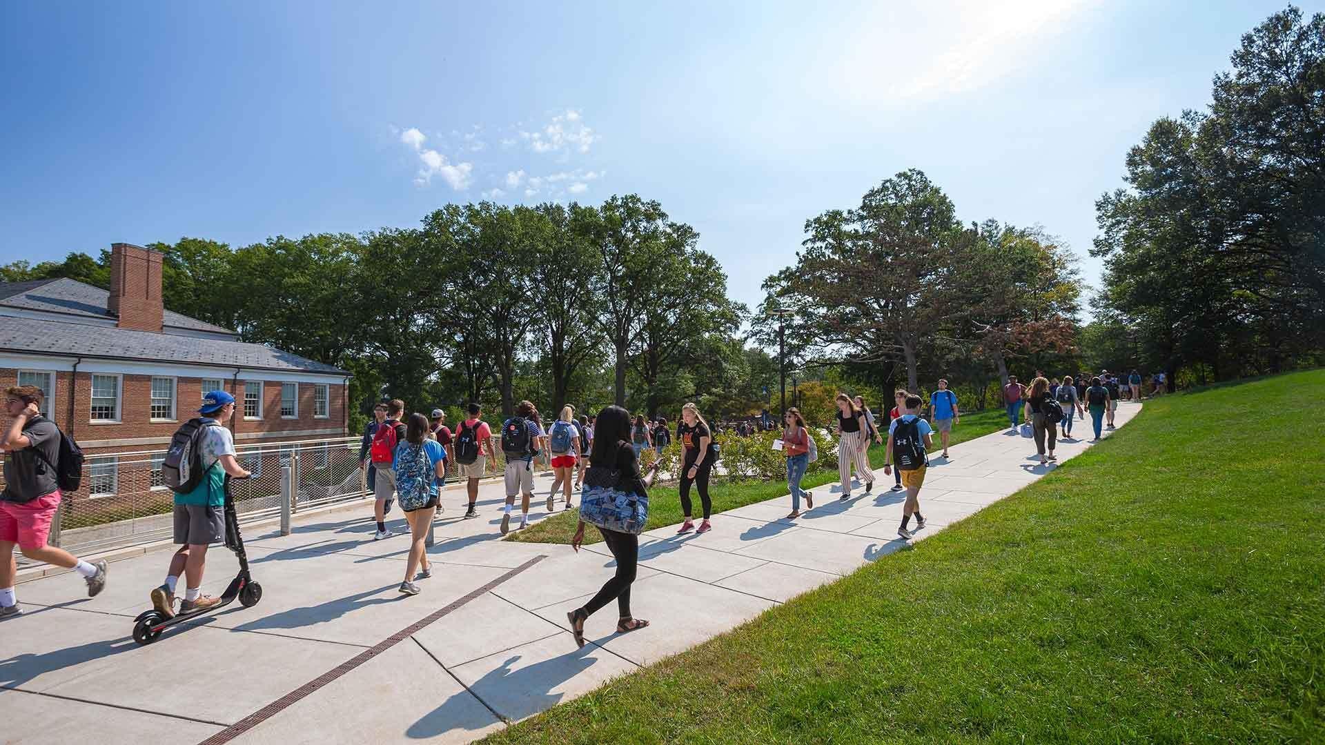 Students walking near ESJ Building