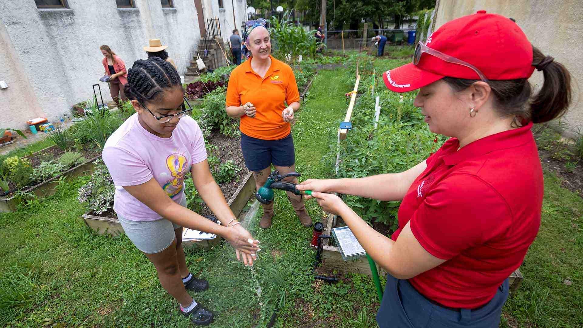 UM Extension Staff at Community Garden