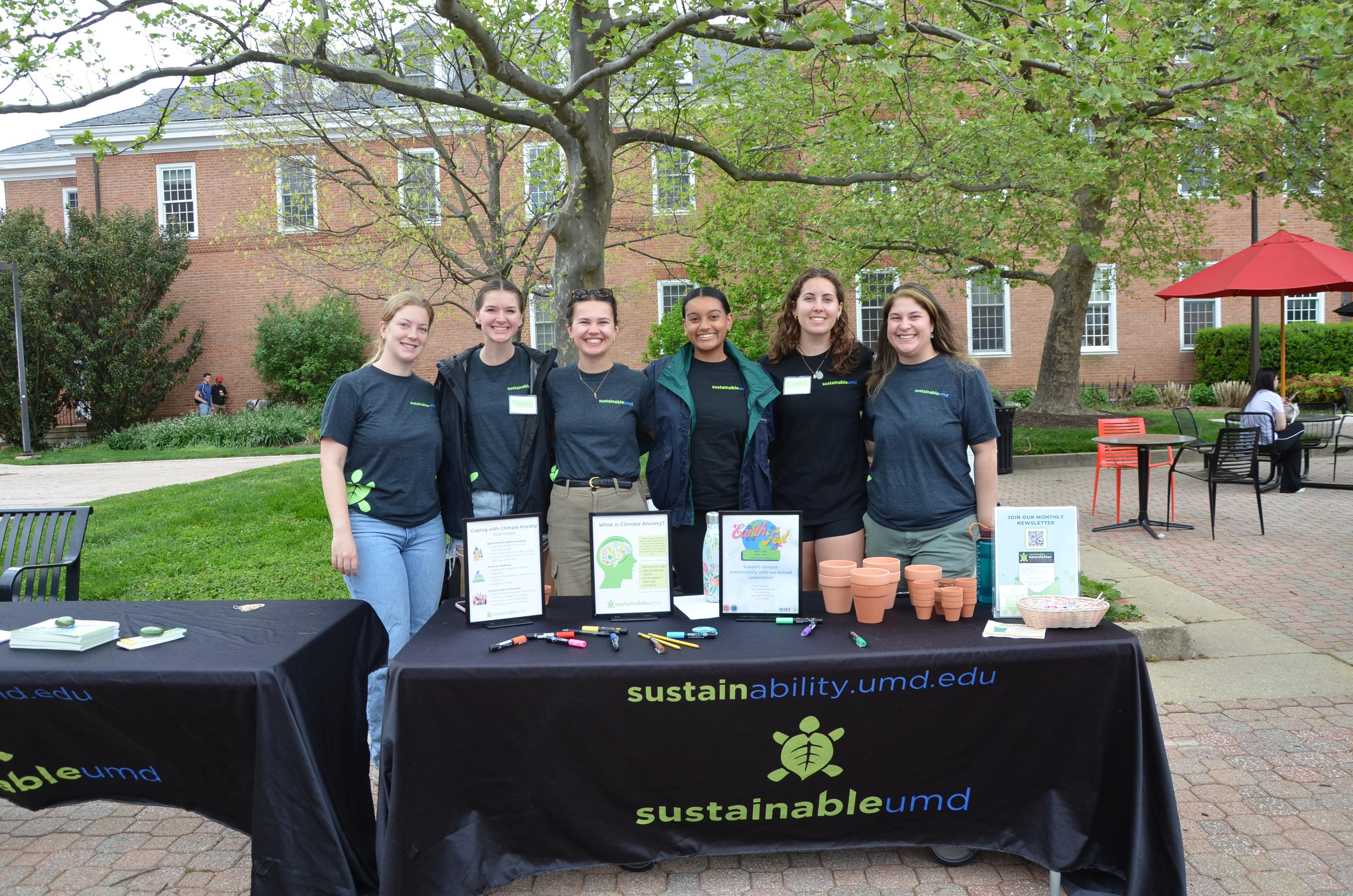 OS staff smiling for a group picture