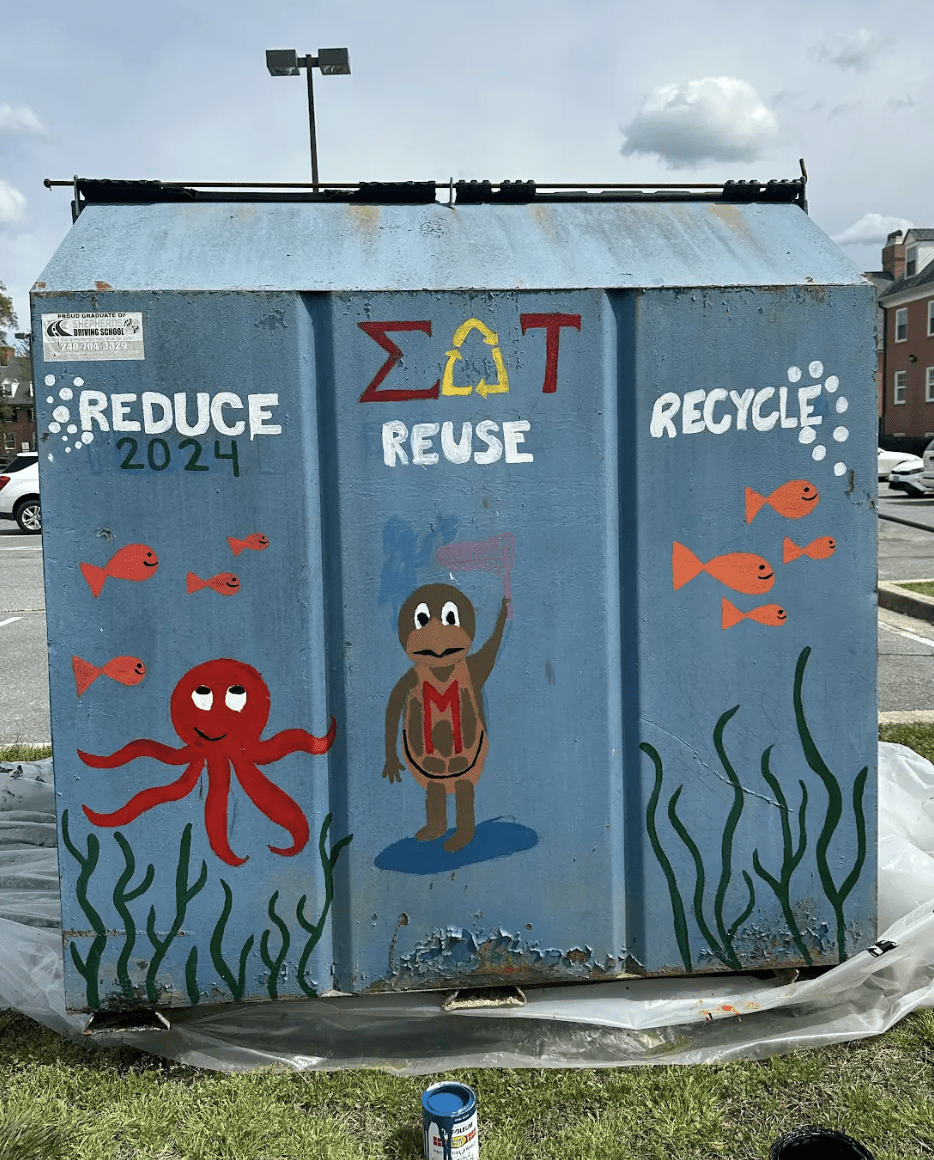 Dumpster painted with Terp, coral, and ocean creatures.