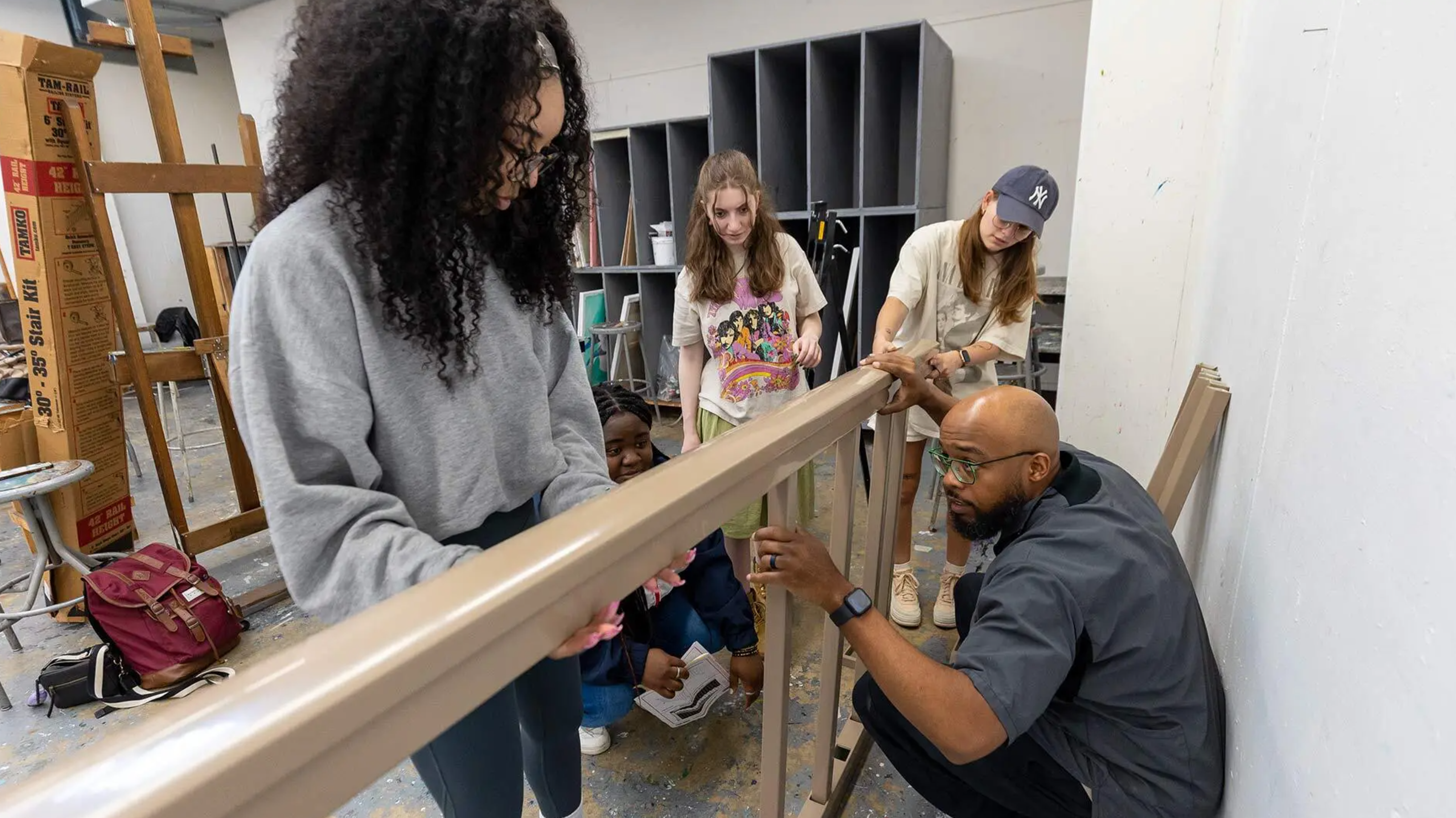 students work on art installation