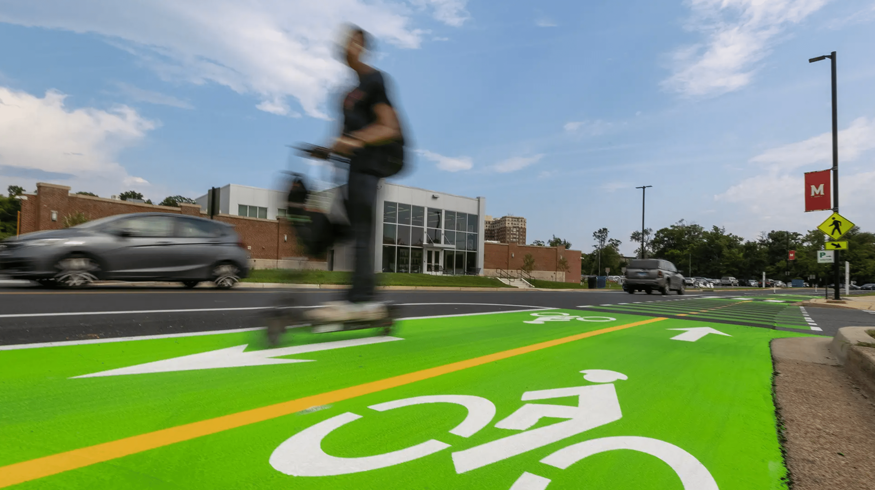 Bright green micromobility lanes on Paint Branch Drive are a popular route for riders who live north of the UMD campus.