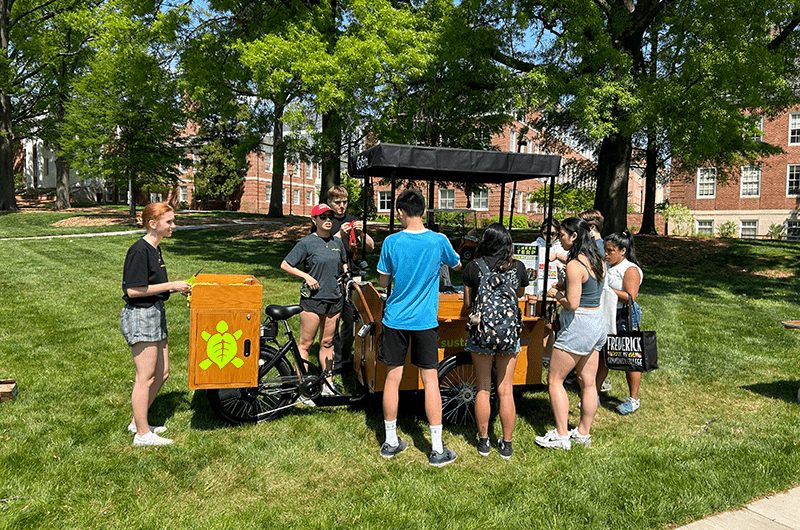 Students at a Sustainability Pop-Up Stand