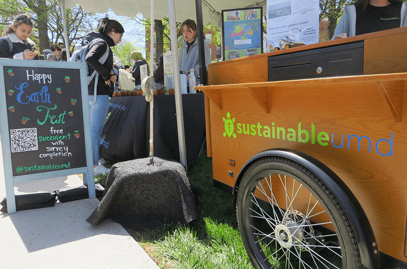 Students at a SustainableUMD stand