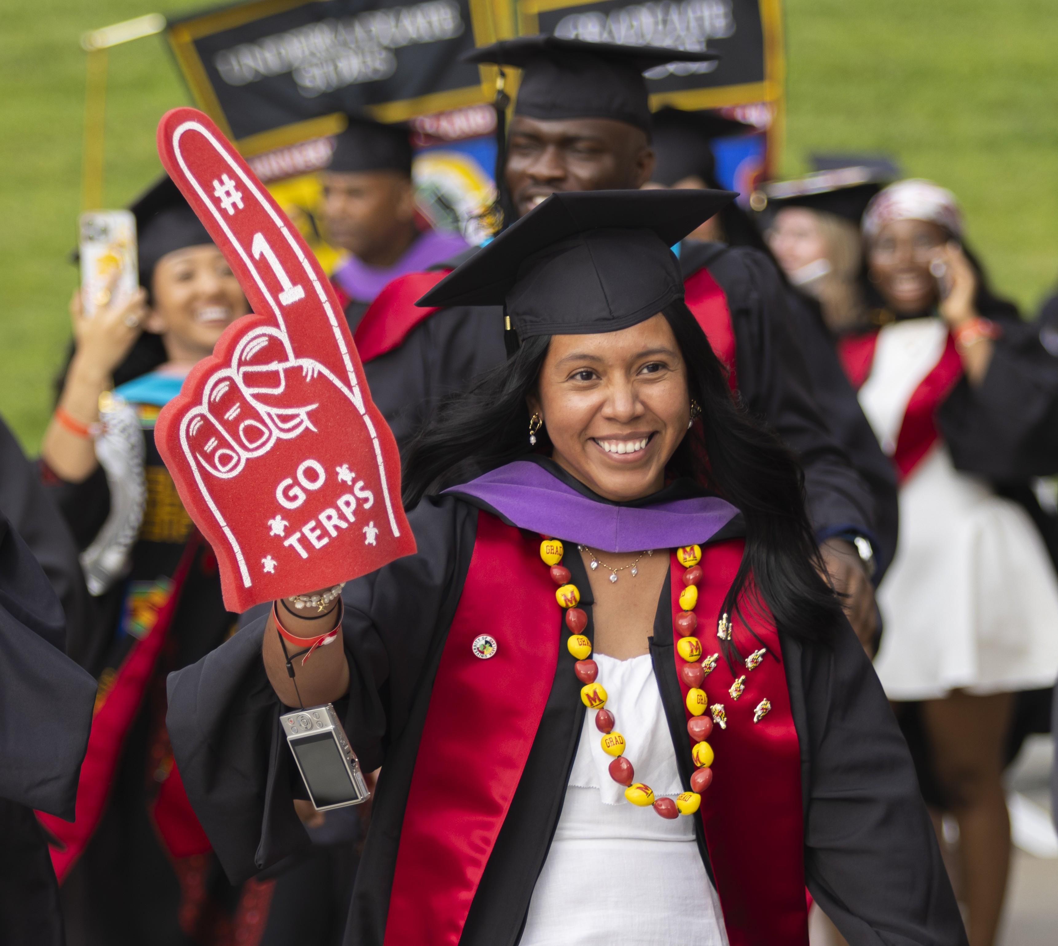Graduating student shows Maryland pride at UMD's spring 2025 commencement ceremony.