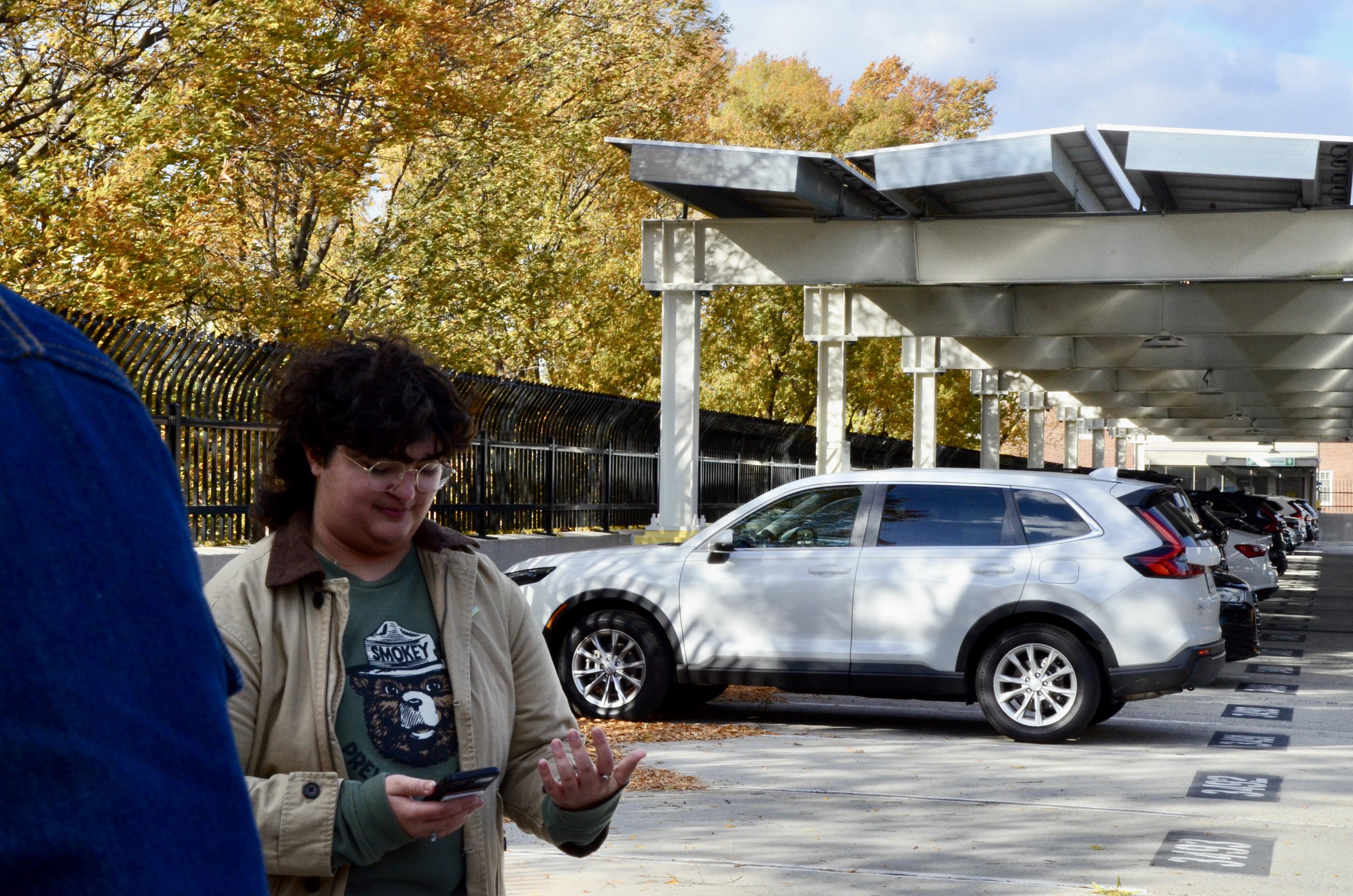The clean energy and education intern speaking at Regents Drive Garage