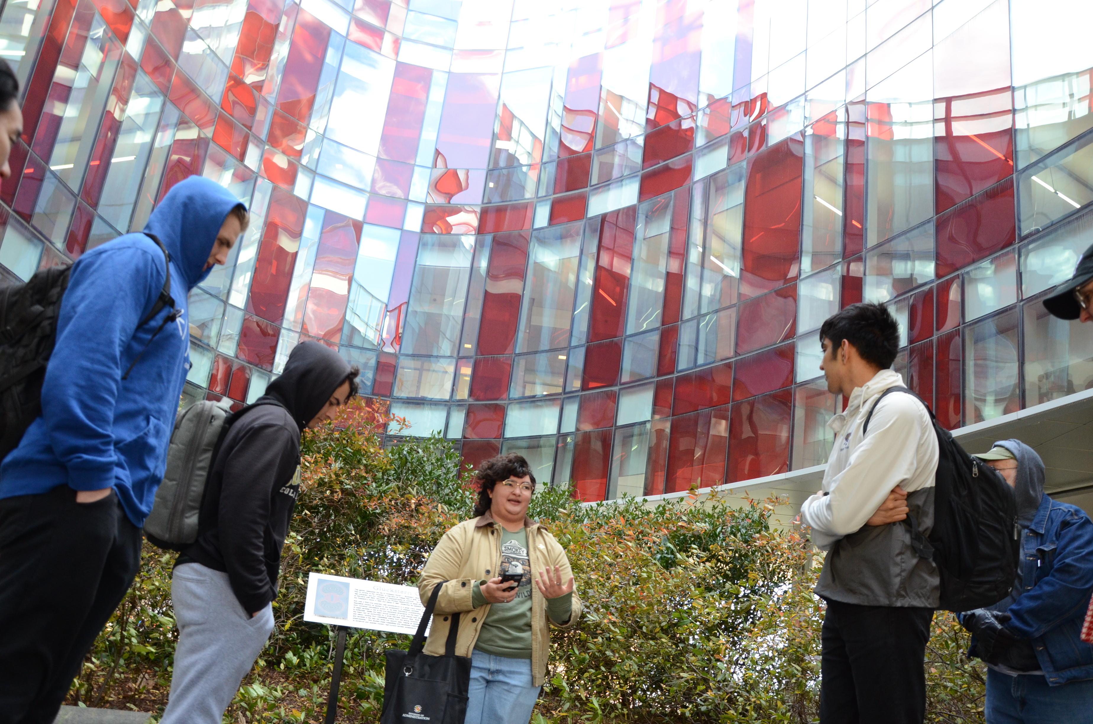 Students gather around in the Physical Sciences Complex Courtyard