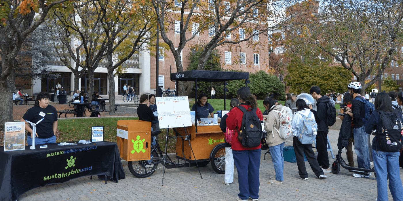 SustainableUMD Outreach Ambassadors talk with students at the 2025 Campus Sustainability Month Celebration.