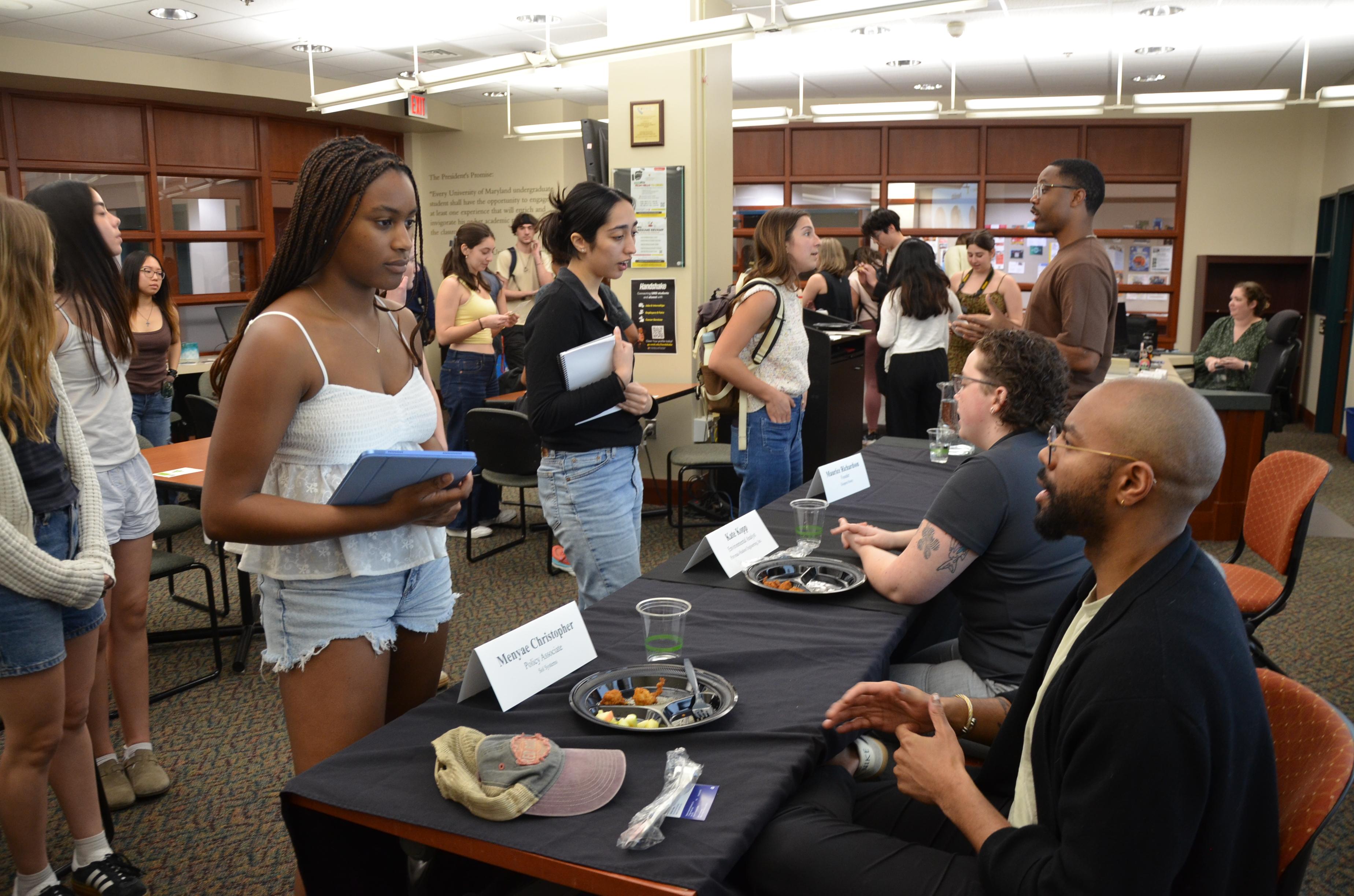 Students speaking to panelists