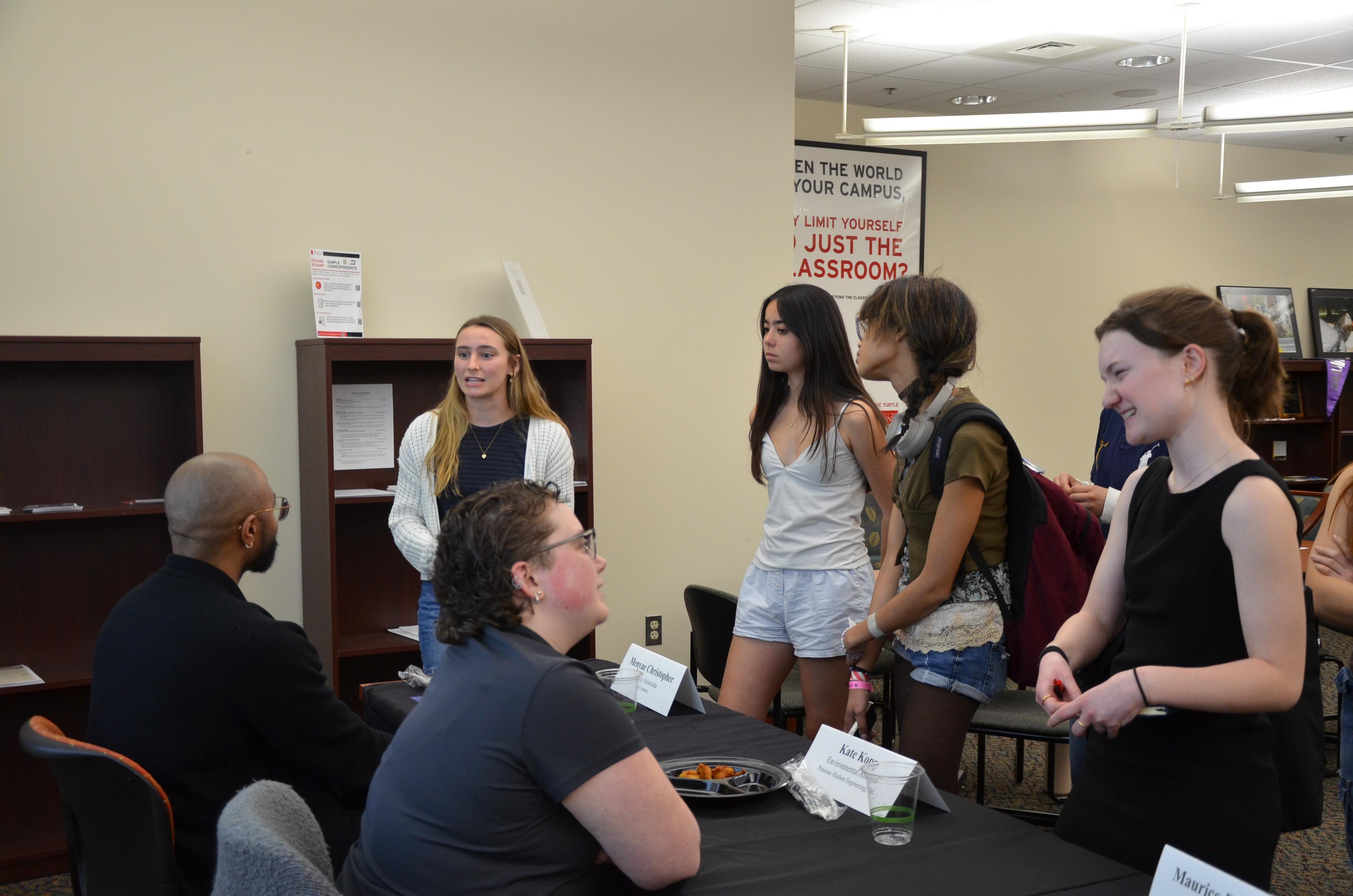 Student speaking to panelist